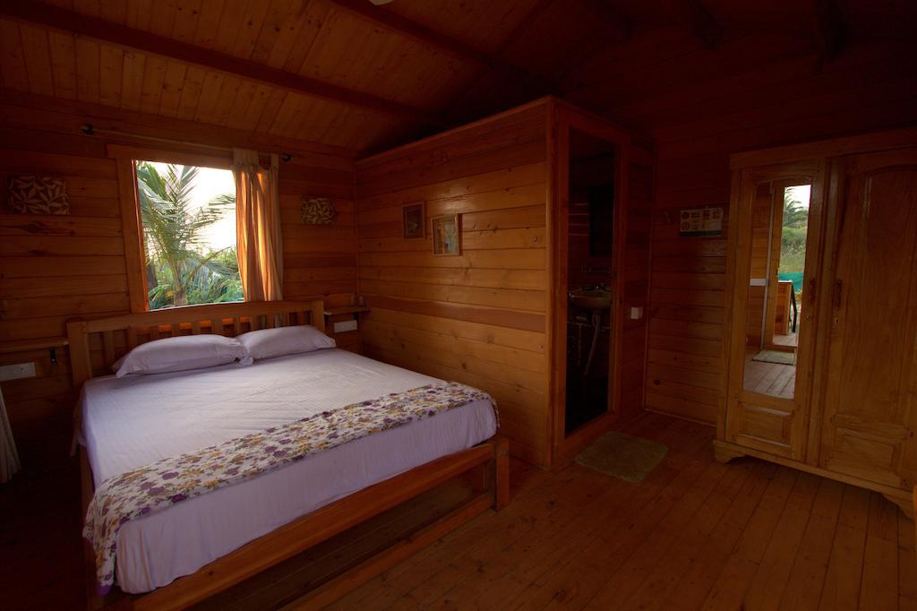 Pele'S Windsong Wood Cottage On The Beach Benaulim Værelse billede